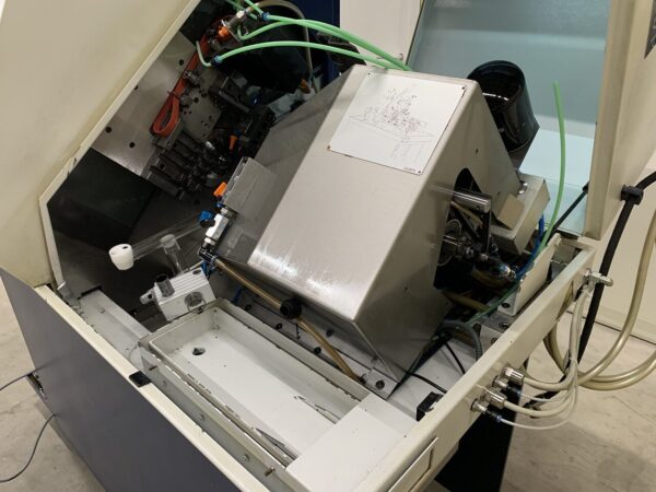 CNC AUTOMATIC LATHE "TORNOS" MICRO 8